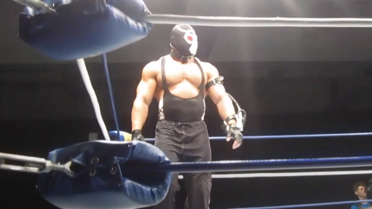 Brian Cage dressed as Bane at the start of the wrestling match for FSCW