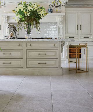 A traditional kitchen with large format kitchen floor tiles with minimal grout lines