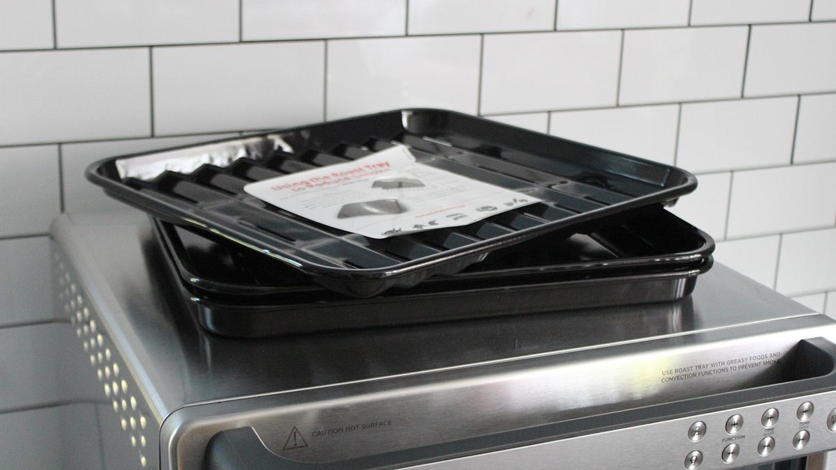Ninja Prestige Smart XL Air Fryer &amp; Countertop Oven being tested in a white kitchen