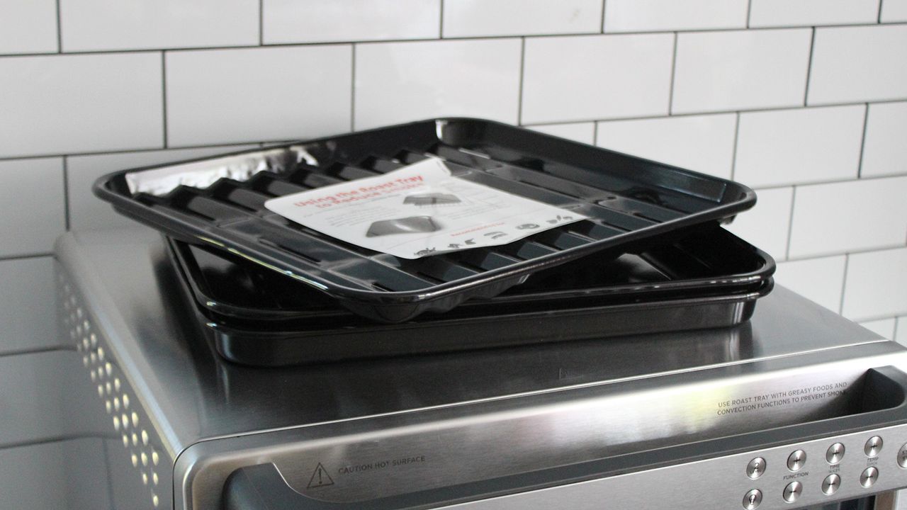 Ninja Prestige Smart XL Air Fryer &amp; Countertop Oven being tested in a white kitchen