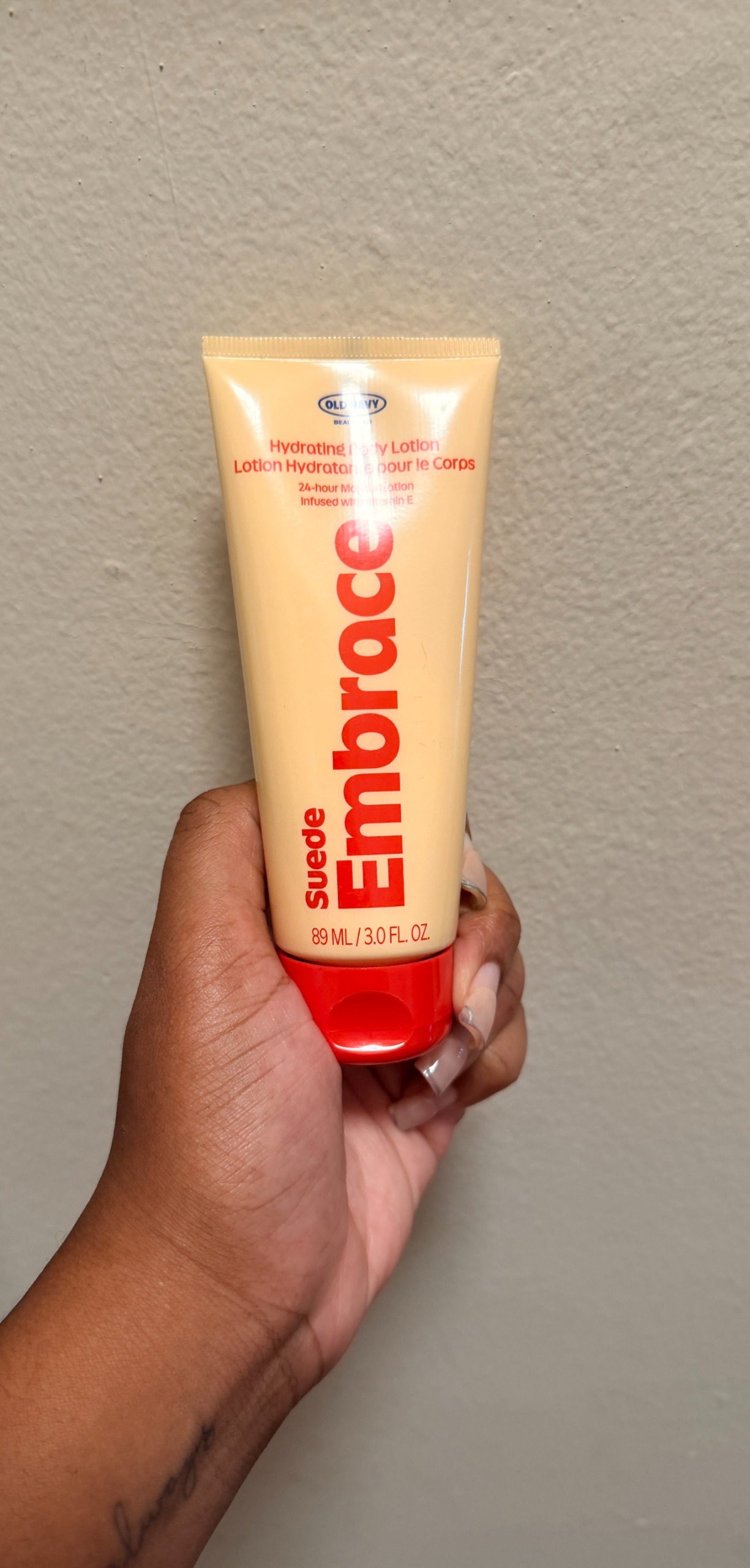 Ariel Baker testing the Old Navy Beauty Body Lotion.