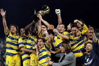 Parma players celebrate after winning the Coppa Italia in May 1999.