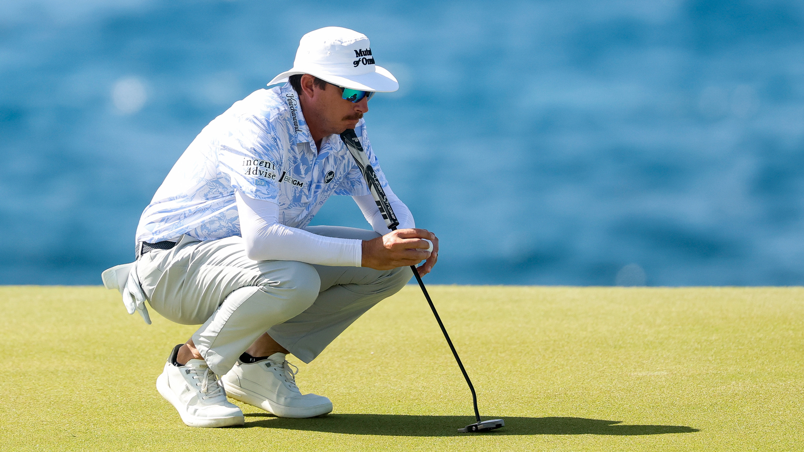 Joel Dahmen lines up a putt
