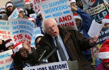 Sen. Bernie Sanders protests for higher national wage.
