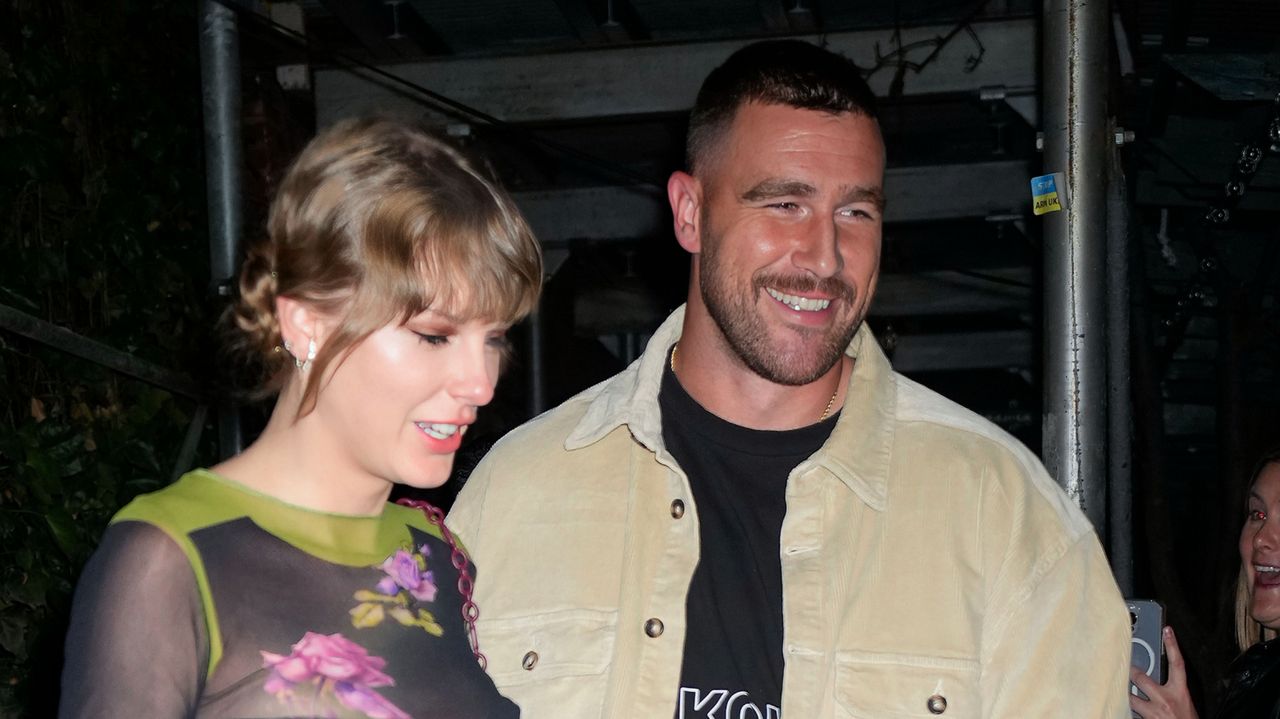 Taylor Swift and Travis Kelce share a New Year&#039;s Eve kiss. 