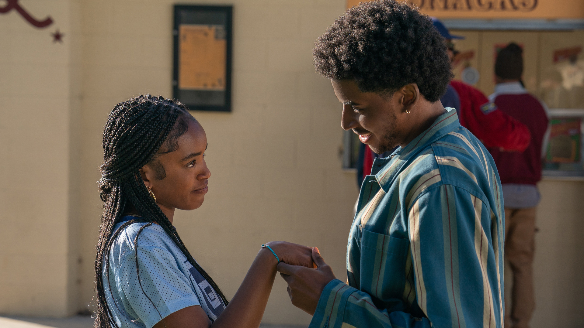 lovie simone as keisha holding hands and smiling with michael cooper jr as justin in the tv show forever