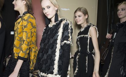 Female models dressed in the Lanvin A/W 2015 backstage of the fashion show