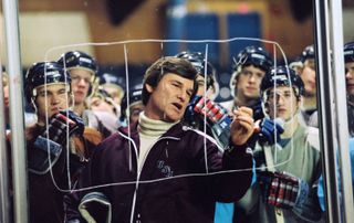 kurt russell relays plays to a team of hockey players in miracle