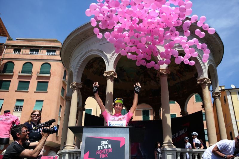 Pink balloons released with pink jersey wearer Michael Matthews on the podium