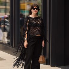 a street style image of Kat Collings