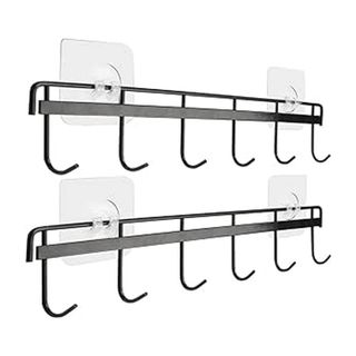 Black utensil hanging rail with adhesive hangers