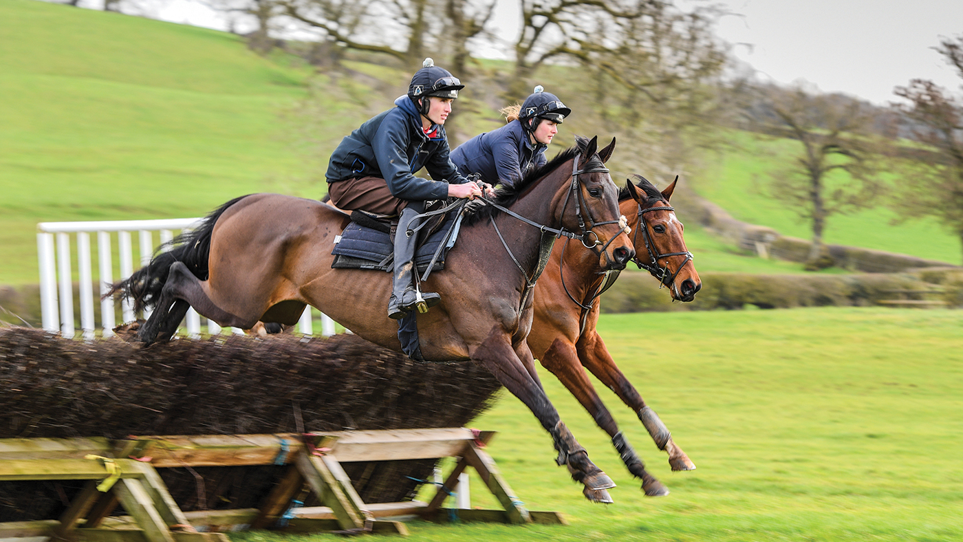 Jack Andrews riding Honestlyntrufully with Gina riding Millstone during morning exercise at G&amp;amp;T Racing near Marton in Warwickshire in the UK on 20th February 2021