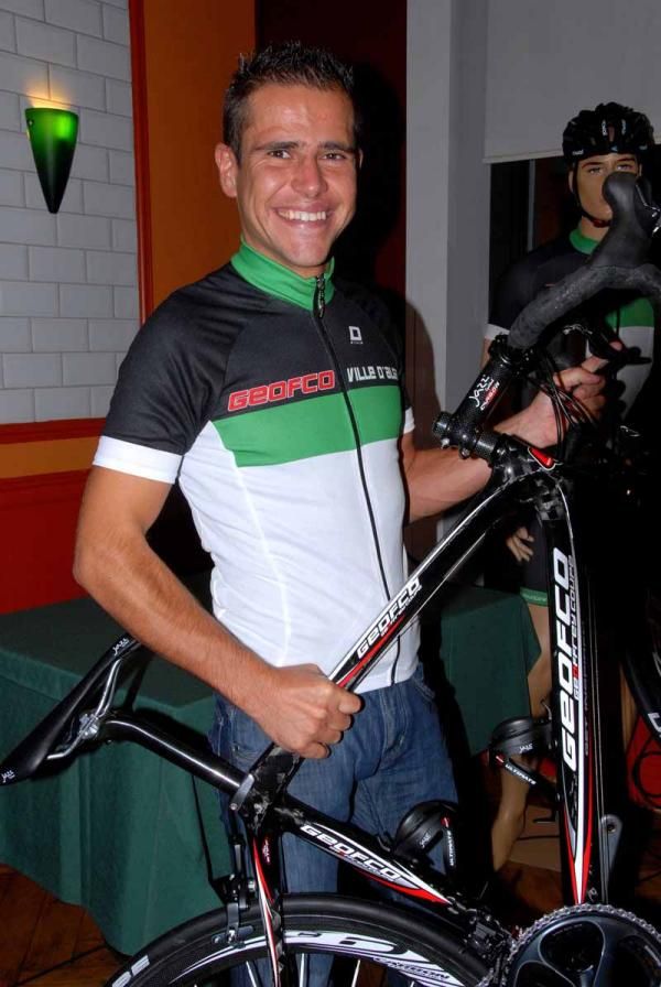 Jerome Gilbert shows off the 2012 jersey and bike