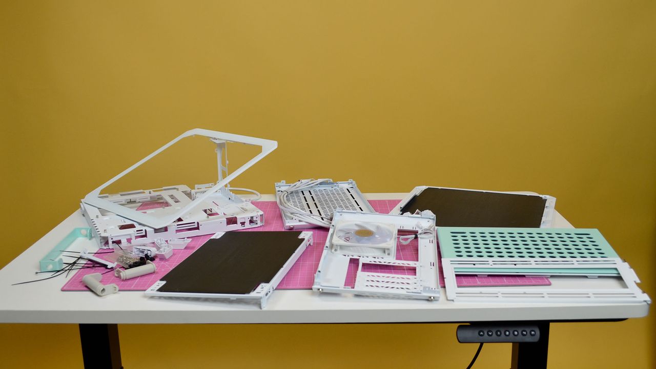 A Cooler Master Qube 500 PC case on a desk