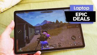 Galaxy Tab S8 in hand with gameplay on screen