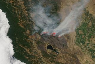 A view posted on Aug. 14, 2018, of the Mendocino Complex Fire in California, which is continuing to grow. It was captured by the Aqua satellite.