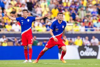 USA Copa America 2024 squad Gio Reyna #7 of the United States celebrates Christian Pulisic #10 of the United States goal at Camping World Stadium on June 12, 2024 in Orlando, Florida. (Photo by Mark Thorstenson/ISI Photos/USSF/Getty Images for USSF)