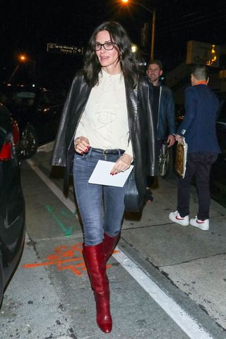 Courtney Cox's statement red boots