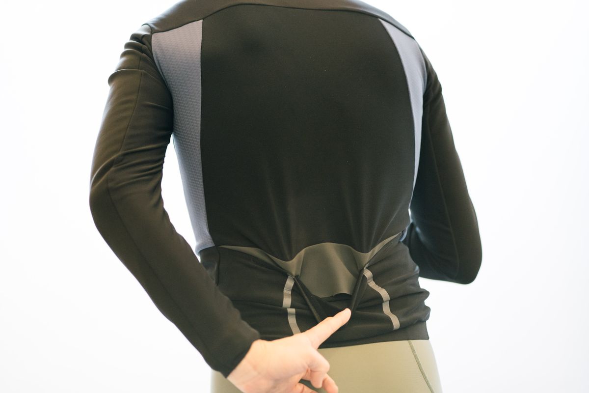 A close up of the internal flap in the rear pocket of a cycling jacket