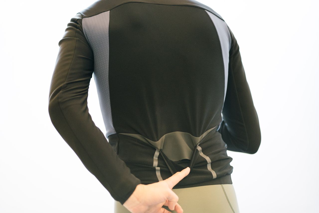 A close up of the internal flap in the rear pocket of a cycling jacket
