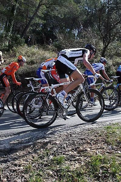 Saxo Bank's Gustav Larsson kept in touch up the climbs.