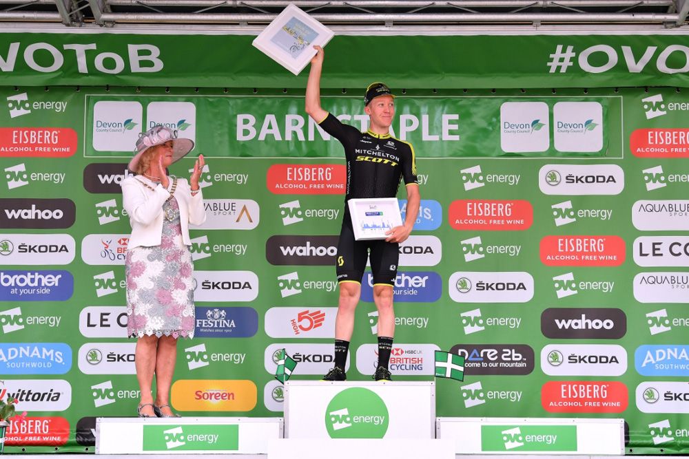 Cameron Meyer (Mitchelton-Scott) shows off his stage winner's spoils