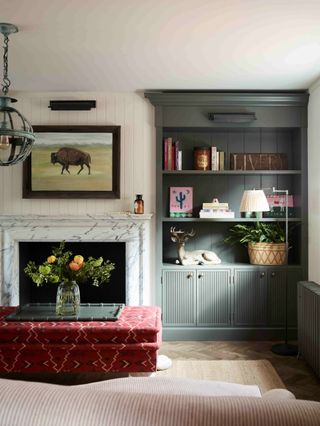 Living room with built in shelving painted grey