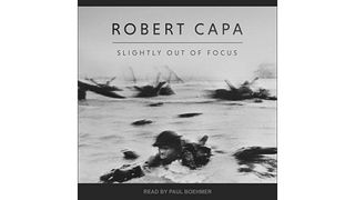 Cover of Slightly Out of Focus by Robert Capa featuring a soldier taking part in the Normandy Landings