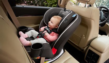 Walmart car seat trade in 2019: child in carseat in car