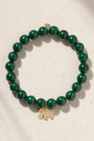 green beaded bracelet with an elephant charm