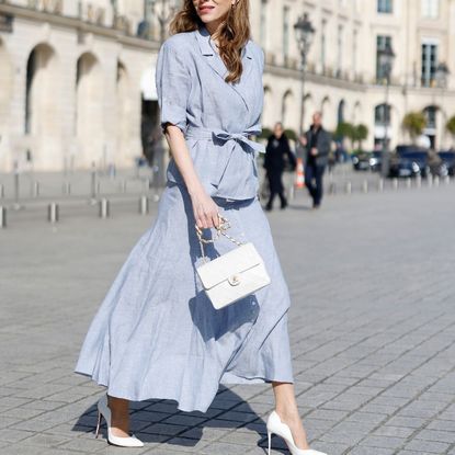 Fashion week attendee wears midi linen skirt
