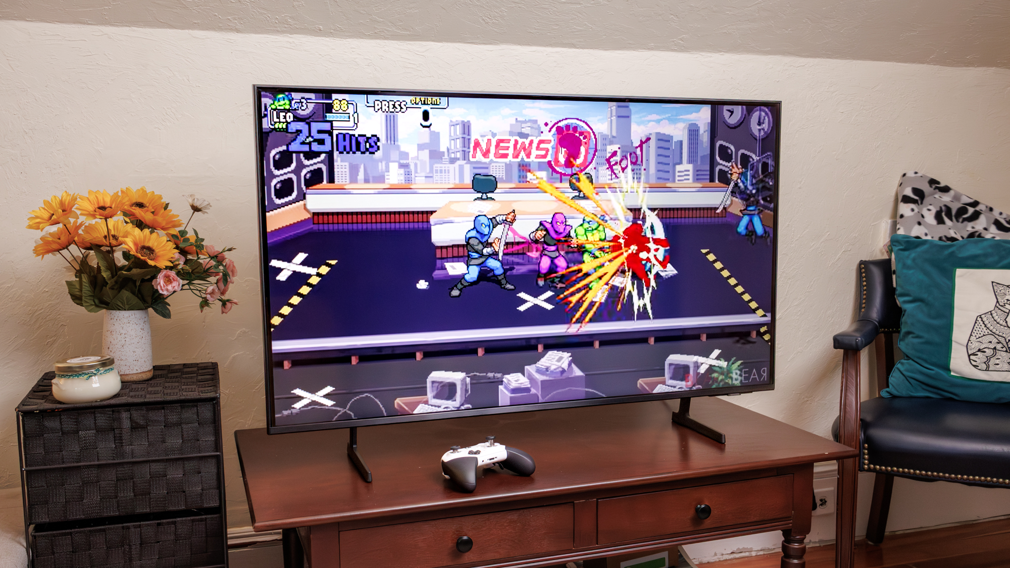 Samsung Q7F QLED TV on a side table