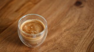 Macchiato coffee in glass cup