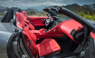 The vivid red interiors of the convertible F-Type add a luxury touch