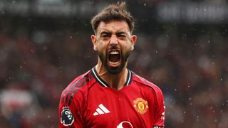  Bruno Fernandes of Manchester United celebrates after Josh Cullen of Burnley (not pictured) scores his teams own goal during the Premier League match between Manchester United and Burnley at Old Trafford on August 30, 2025 in Manchester, England. 