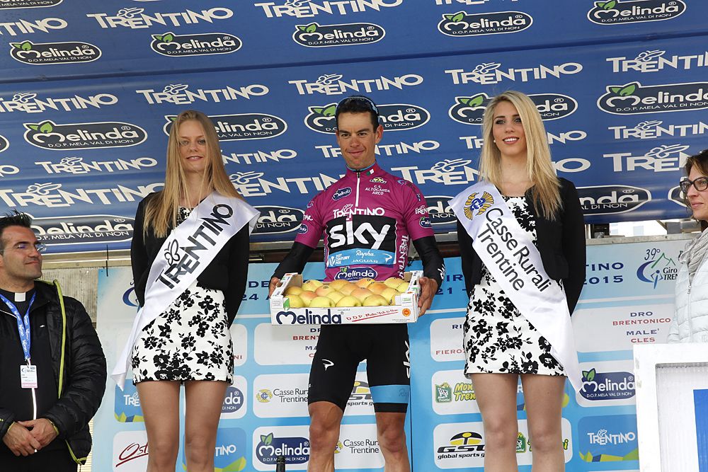 Team Sky's Richie Porte wears the fuchsia leader's jersey