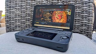 AYANEO Flip DS with Steam page open.