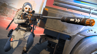 Player behind a truck holding a sniper rifle