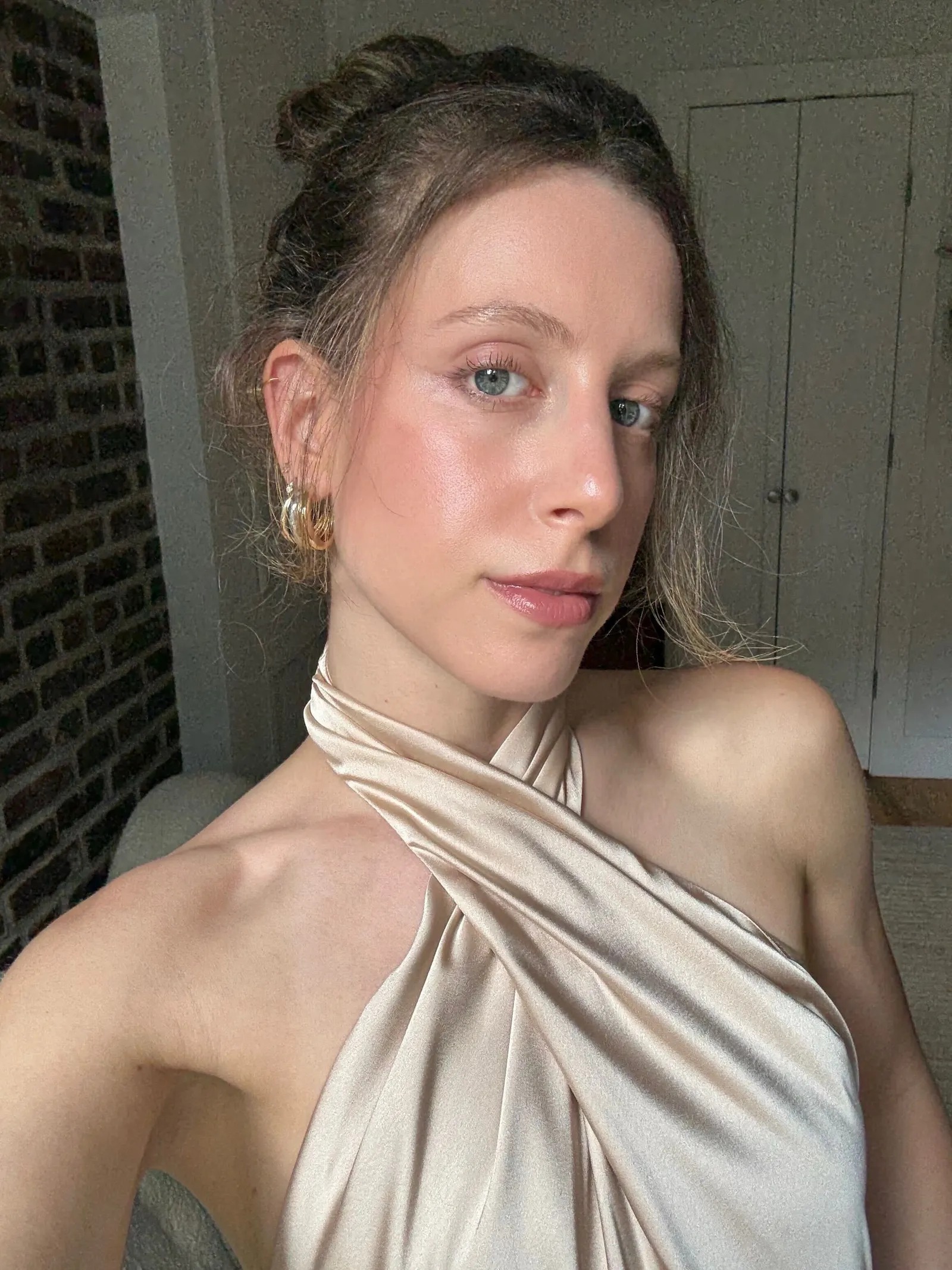 Schneider wearing the Victoria Beckham Beauty Foundation Drops.