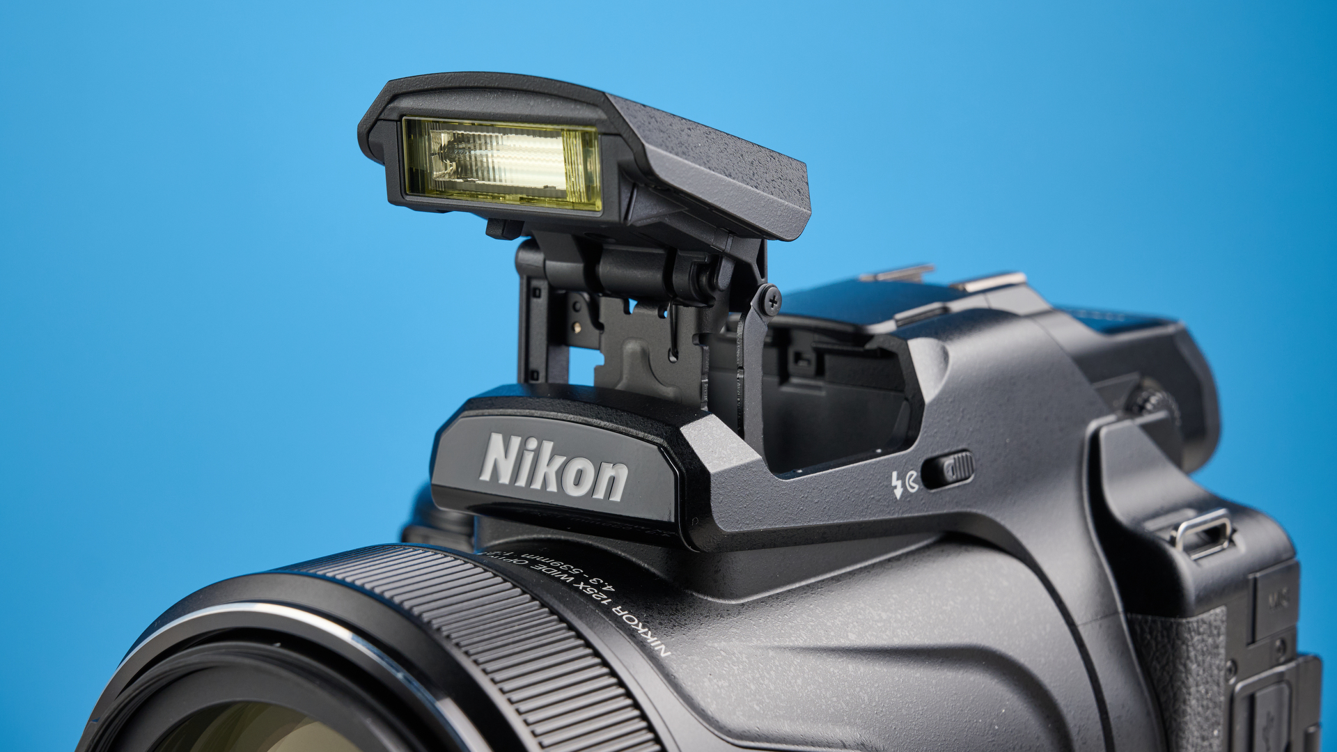 A black Nikon Coolpix P1100 digital camera