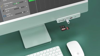 Hyper 6 in 1 USB hub in green attached to green iMac