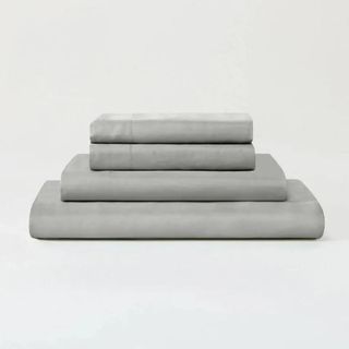 Dove gray bed sheets folded 
