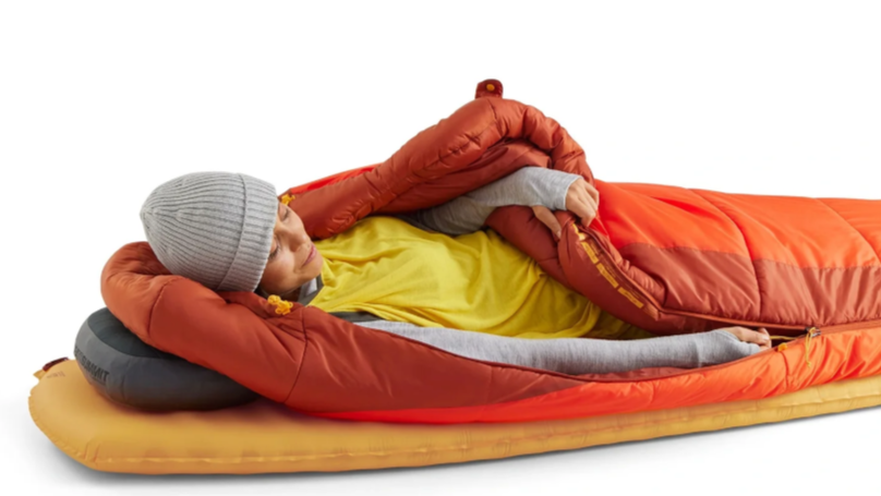 A model testing the Sea to Summit Revive sleeping bag and pad