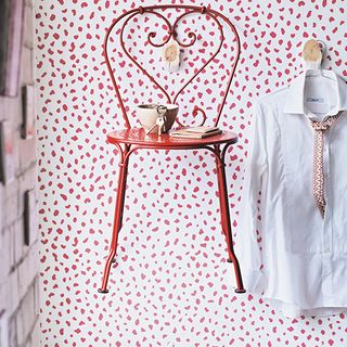 wallpaper wall with red chair and shirt
