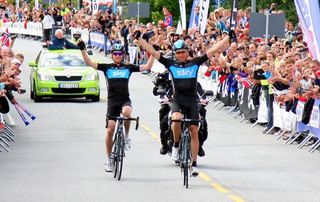 Edvald Boasson Hagen celebrates victory in the road race while Sky teammate Lars Petter Nordhaug earns the silver medal.
