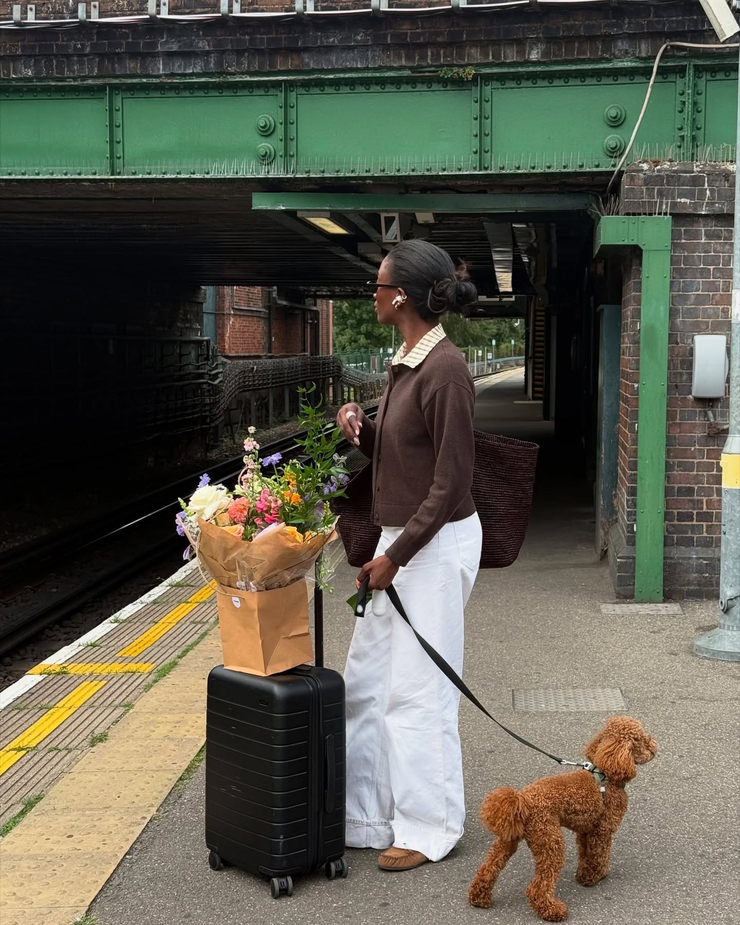 @_livmadeline wearing a white denim outfits spring 2026