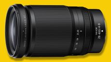 Nikon Z 28-400mm f/4-8 VR lens on yellow background