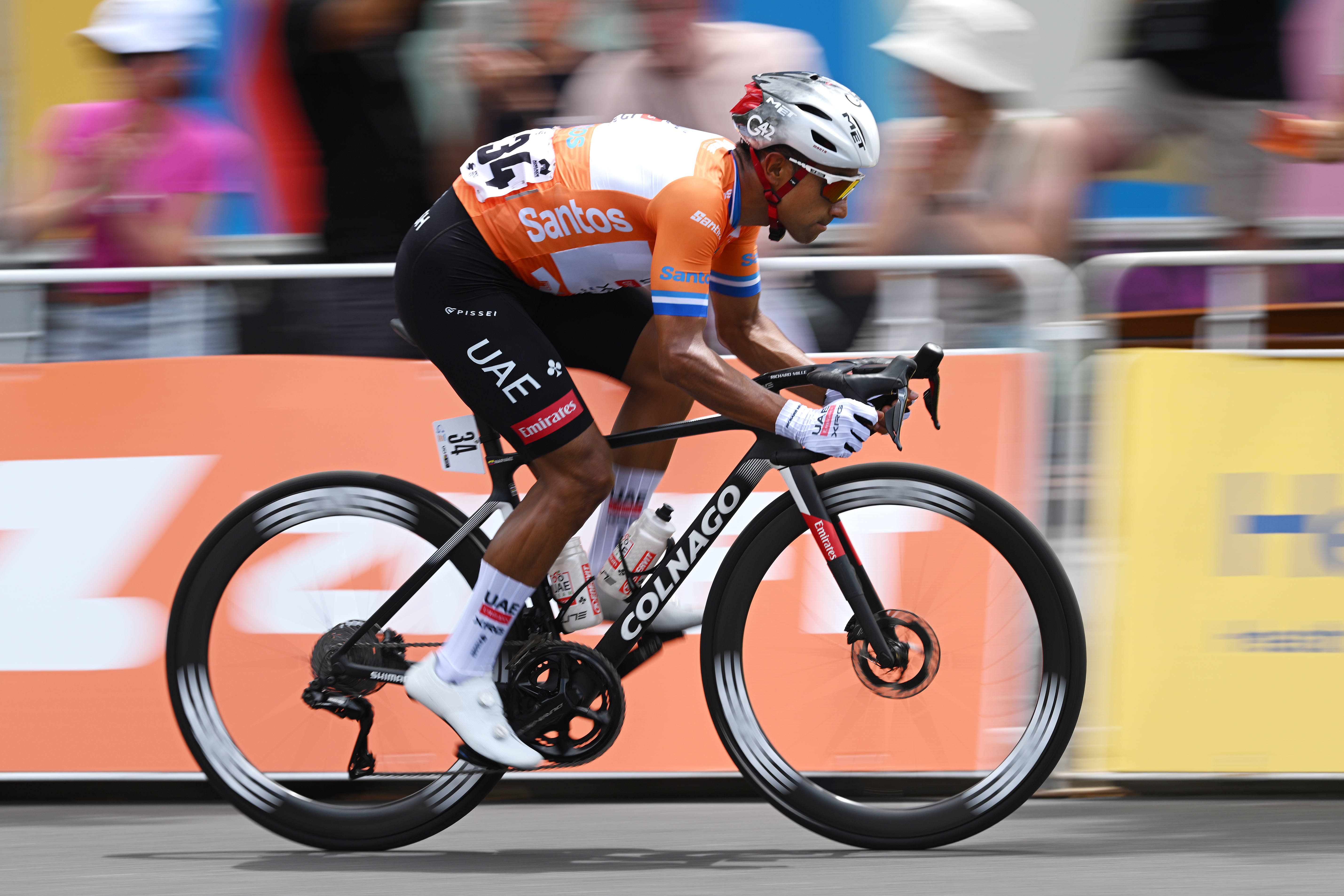 ADELAIDE, AUSTRALIA - JANUARY 26: Jhonatan Narvaez of Ecuador and UAE Team Emirates Xrg - Orange Leader Jersey competes during the 25th Santos Tour Down Under 2025, Stage 6 a 90km stage from Adelaide to Adelaide / #UCIWT / on January 26, 2025 in Adelaide, Australia. (Photo by Dario Belingheri/Getty Images)