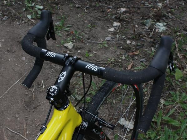 Laser-etched logos on the house-brand bar, stem (and seatpost) make for a complete visual package.