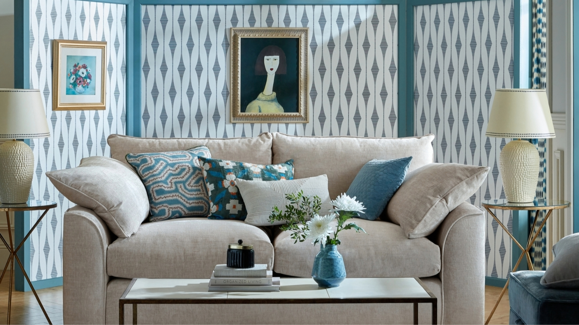 Chintzy cushions on neutral sofa